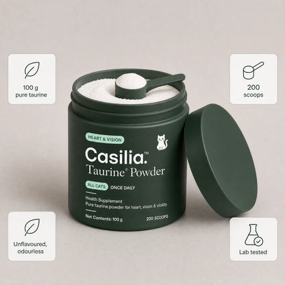 Cat eating from a bowl, the Casilia™ Taurine tub beside it